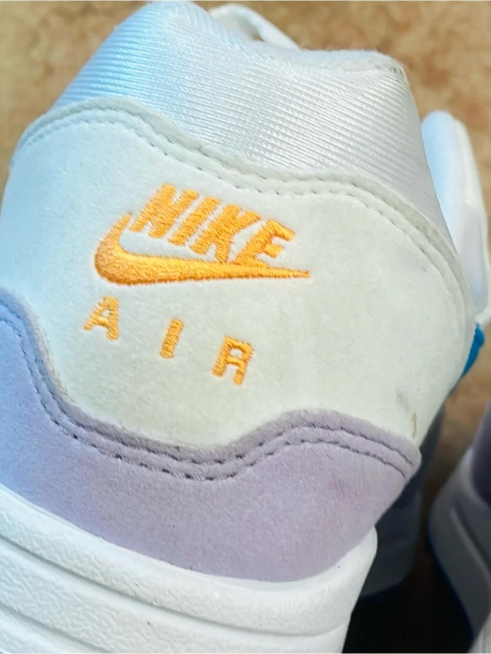 Nike Women’s White Sneakers with Pink, Blue & Lavender Accents